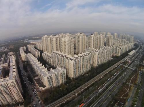 Guangzhou has a population of over 300,000 people. Why is it called first village in China? you were there
