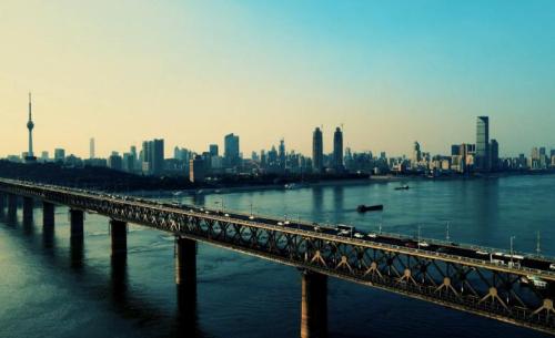 The first bridge over Wanli Yangtze River with cars at top and trains at bottom, China's first dual-use road-rail bridge.