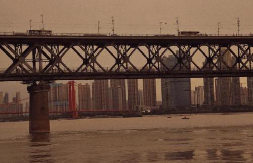 The first bridge over Wanli Yangtze River with cars at top and trains at bottom, China's first dual-use road-rail bridge.