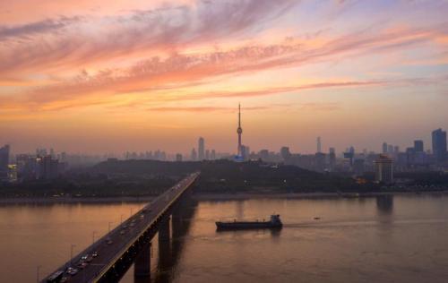 The first bridge over Wanli Yangtze River with cars at top and trains at bottom, China's first dual-use road-rail bridge.