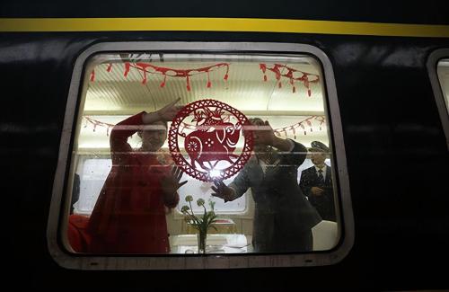 Hangzhou has a "slow train" that passes through 46 stations, whole trip takes 42 hours, and scenery is beautiful along the way.