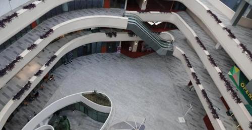 This is a real photo of only shopping center on "Island of the Rich" in Guangzhou. Tourists say, "The rich in Guangzhou really keep a low profile."