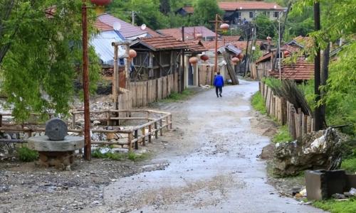 In a village deep in mountains of Jilin, everyone speaks Shandong, but children do not know where their hometown is.