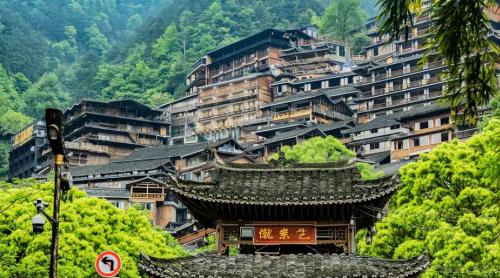 Be sure to visit tourist attraction in Guizhou, largest Miao village in world, although it is now very commercialized.