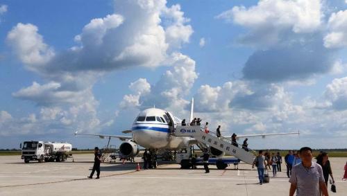 At a lonely airport in northeast China, there is only one flight a day, and staff has little to do after flight.