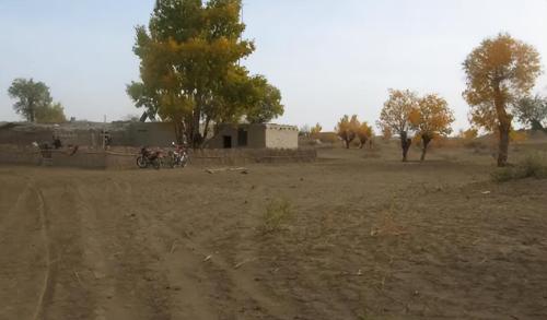 In middle of Taklamakan desert in Xinjiang, a mysterious ancient village was discovered, origin of whose inhabitants is still unknown