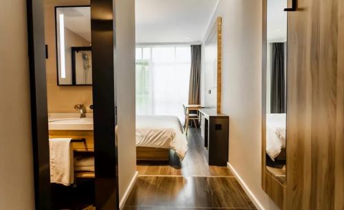 When I sleep in a hotel, why does waiter remind me to turn on light in bathroom? know as soon as possible
