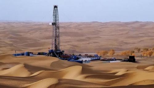 How deep is Takla Makan Desert? If you dig up all the sand, what's under it?