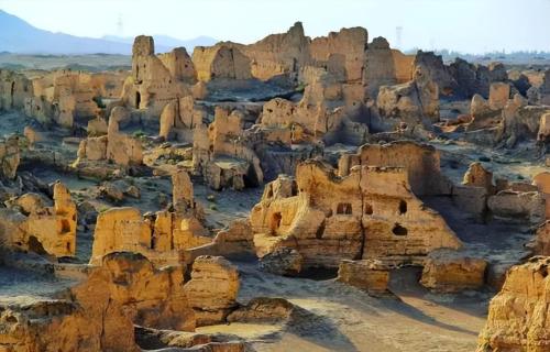 How deep is Takla Makan Desert? If you dig up all the sand, what's under it?