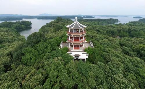 Why does this modest Tier 3 city in Henan Province carry honorary title of "Permanently Liveable City"?